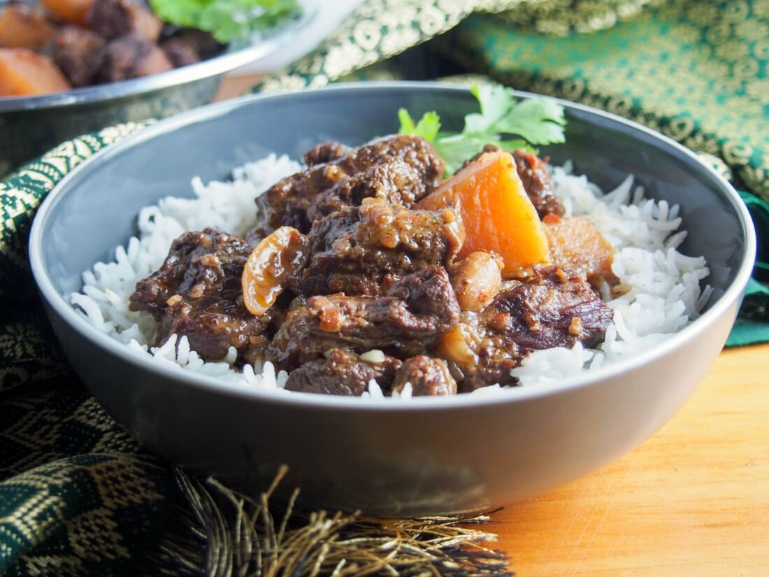 Bowl of beef massaman curry served over rice