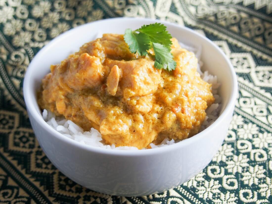 Kid-friendly salmon curry in bowl over rice