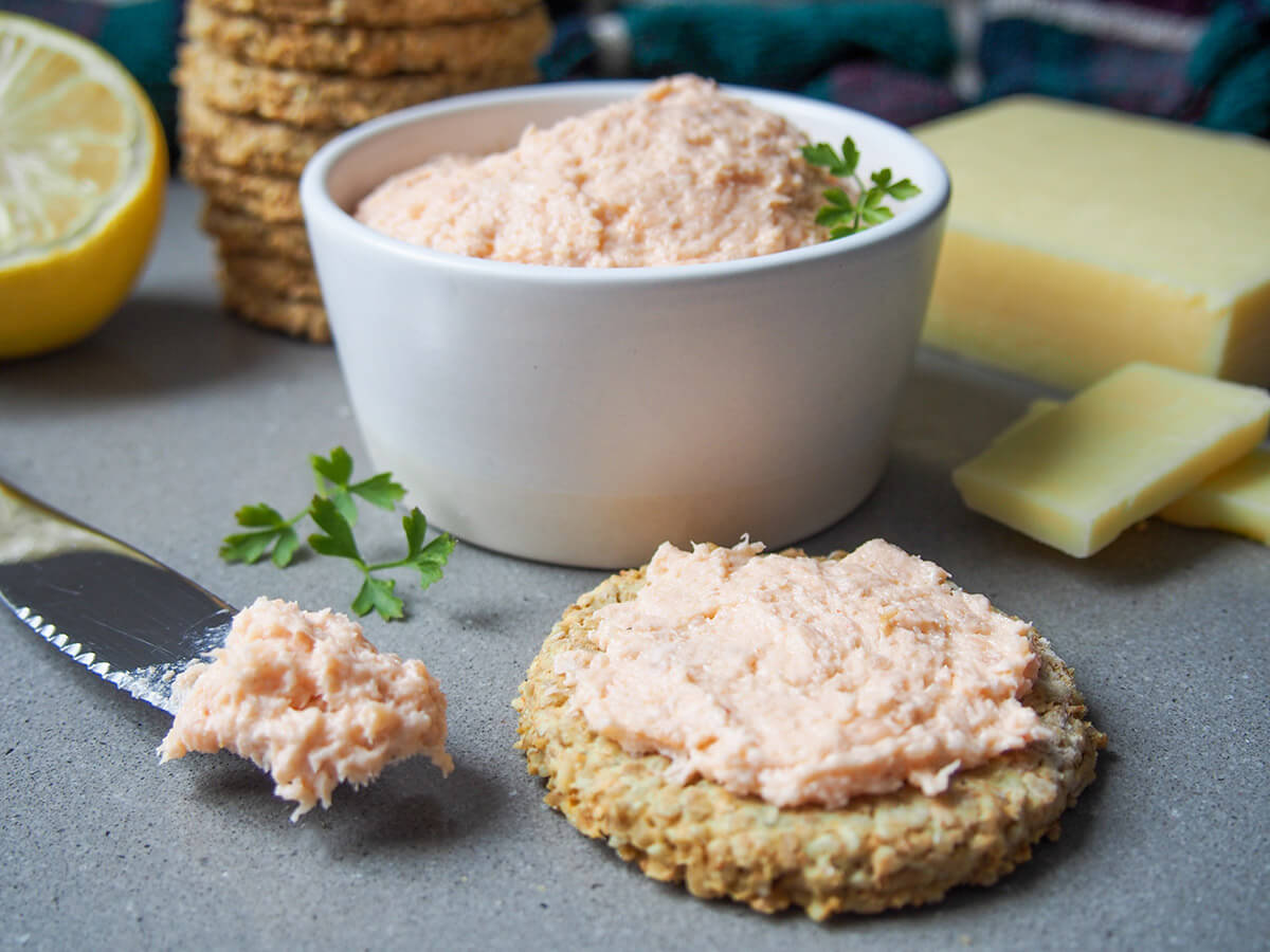 smoked salmon pate on oatcake and in dish behind