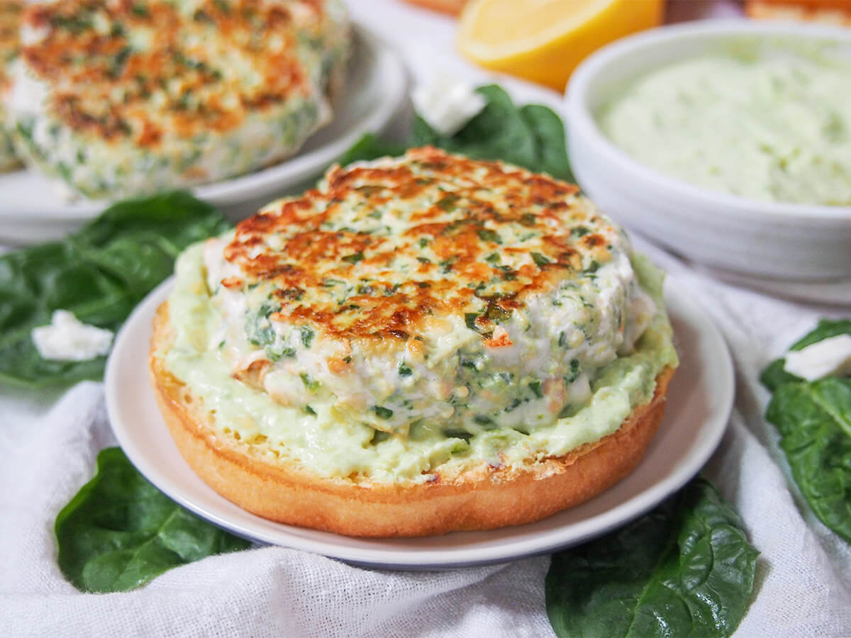 spinach feta salmon burger on small plate